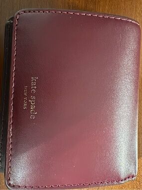 kate spade Burgundy Leather Compact Wallet with Gold Logo